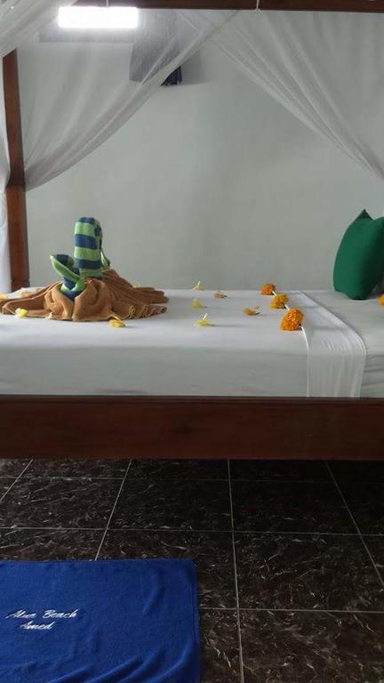 Alur Beach Homestay Amed Esterno foto