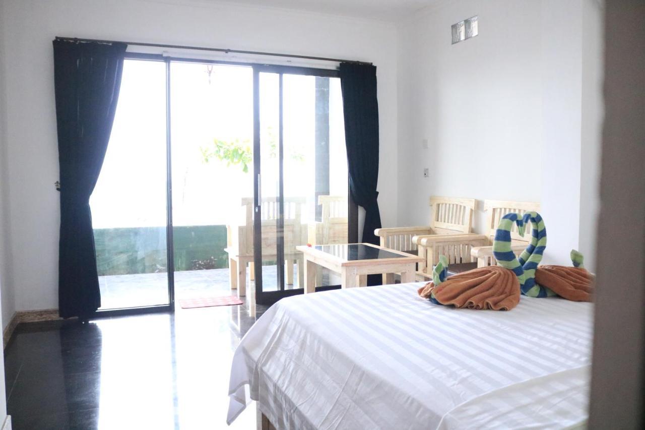 Alur Beach Homestay Amed Esterno foto